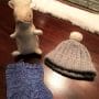 Knitted hat and socks with squirrel stuffed animal