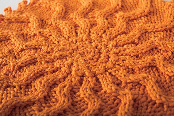 Free Cabled Sunburst Washcloth pattern from Knitpicks.com