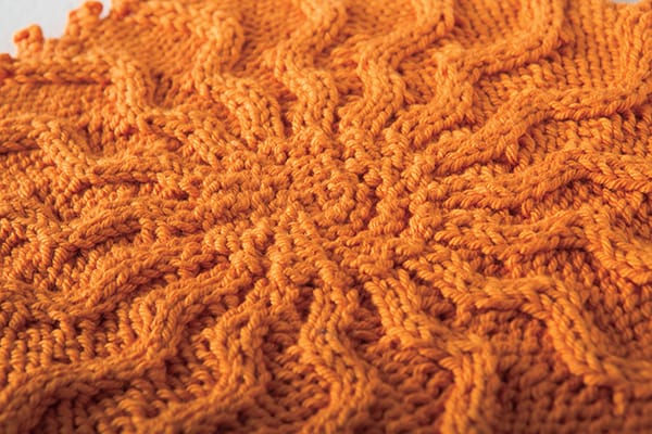 Free Cabled Sunburst Washcloth pattern from Knitpicks.com