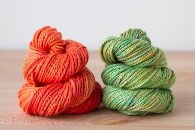 coral and greens dyed over orange Shimmer Bulky yarn