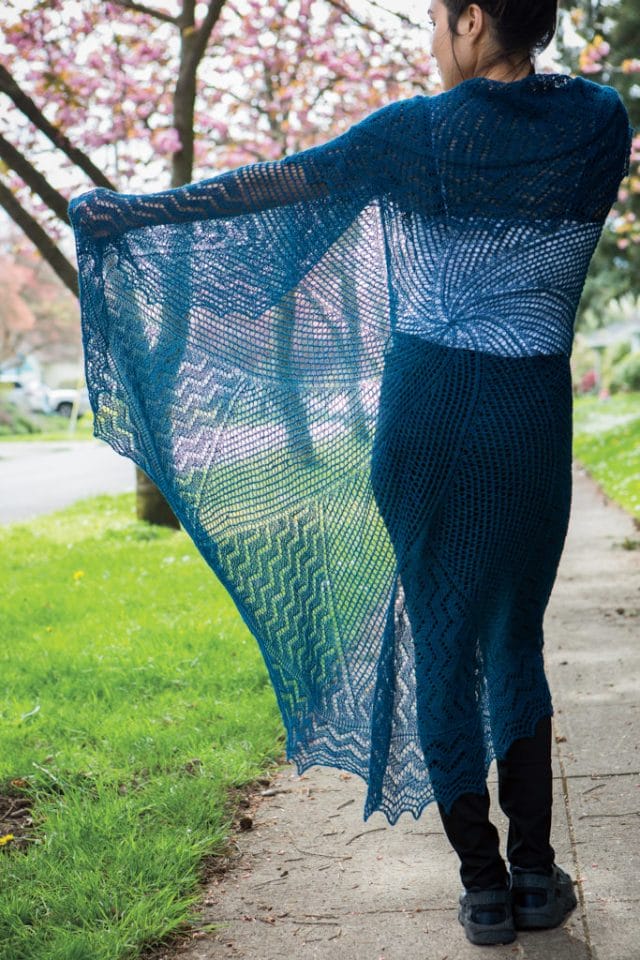 Model showing off Claire Slade's Cymopoleia lace shawl