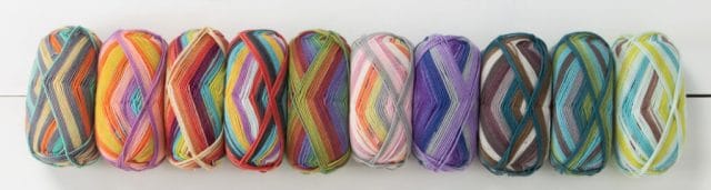 Skeins of all ten new Felici colors, lined up in a long row