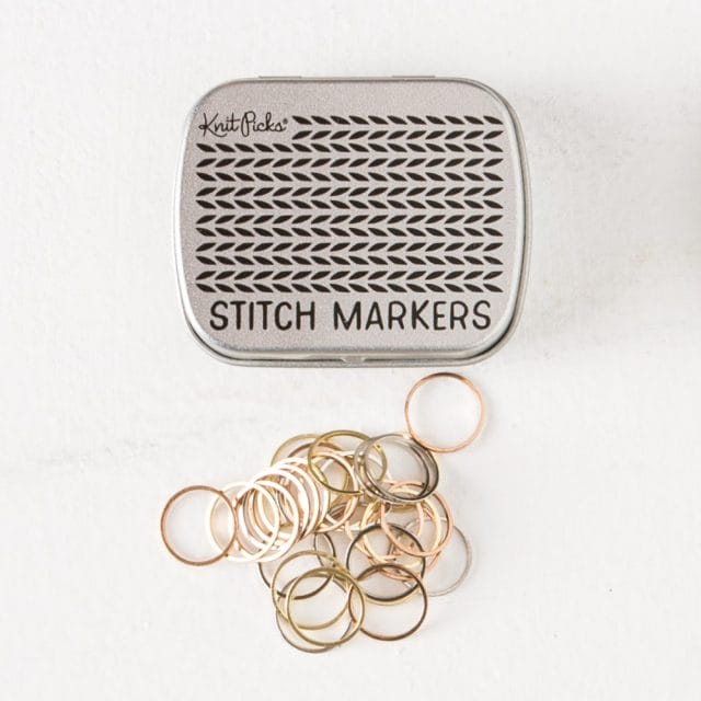 Knit Picks large metallic stitch markers with storage tin.