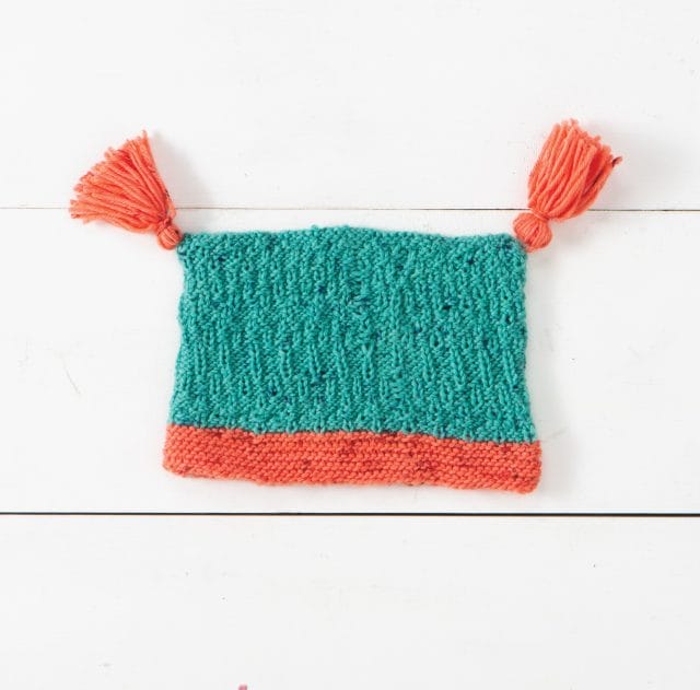 Rocky Road Tassel Hat knit in limited edition Stroll Speckle Sock Lab yarns - Staff Project.