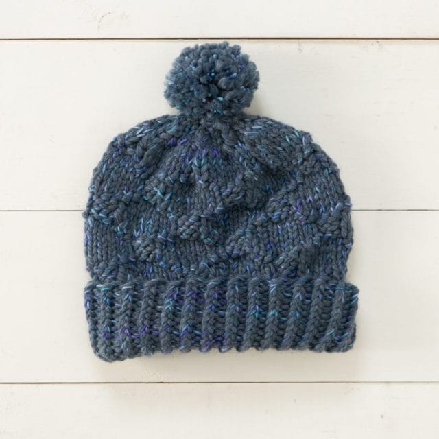 Baltimore Hat knit in Biggo and Capretta Handpaint Superwash Special Reserve yarns - Staff Project.