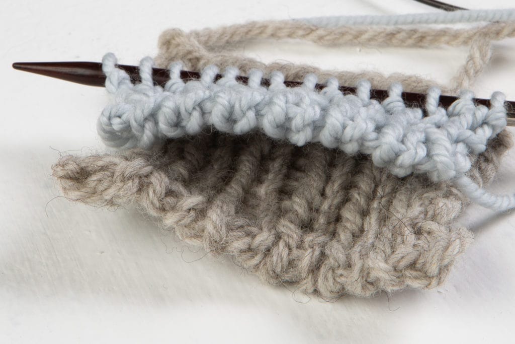 two swatches with long tail tubular cast on edges