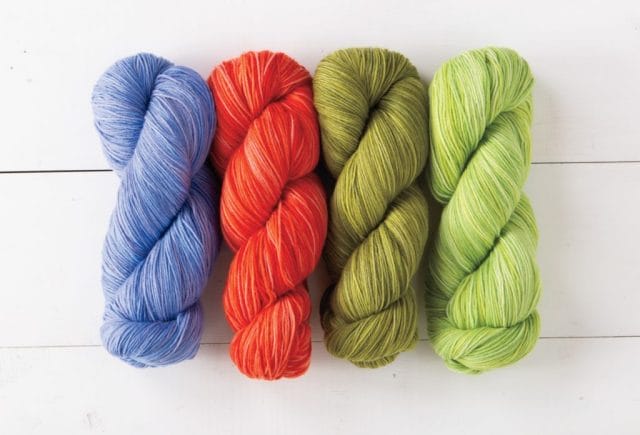Four bright new colors of Stroll Tonal sock yarn.