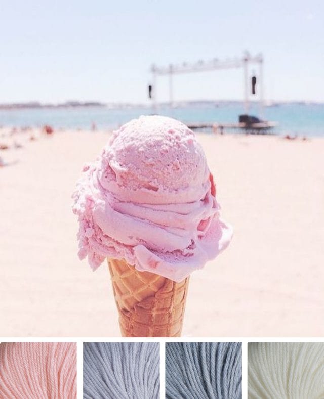 A close up of a strawberry ice cream cone at the beach. Beneath is a color palette that consists of four yarn swatches in pink, lilac, light blue, and white.