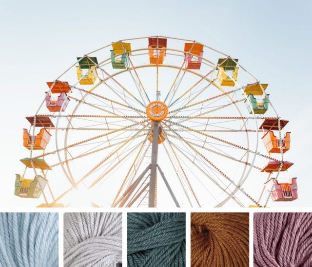 A colorful ferris wheel soars into the sky. Beneath is a color palette that consists of five yarn swatches in light blue, gray, dusty green, rust, and dusty rose.