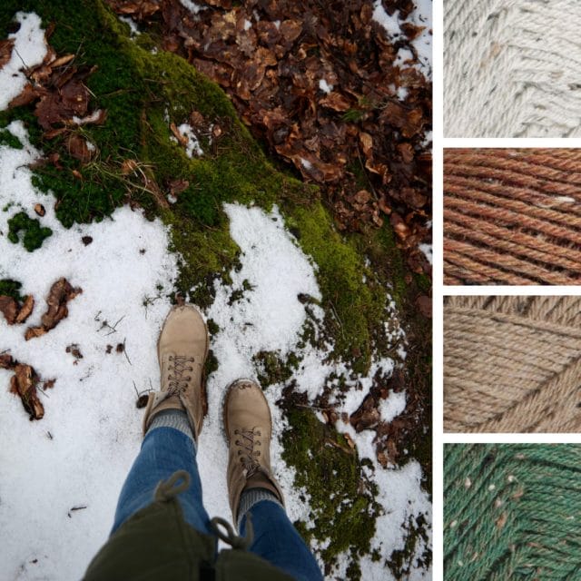 A pair of boots hiking in a snowy wooded area, along with yarn in the colors light tweed gray, warm orange-brown tweed, medium tan tweed, and mossy green tweed.