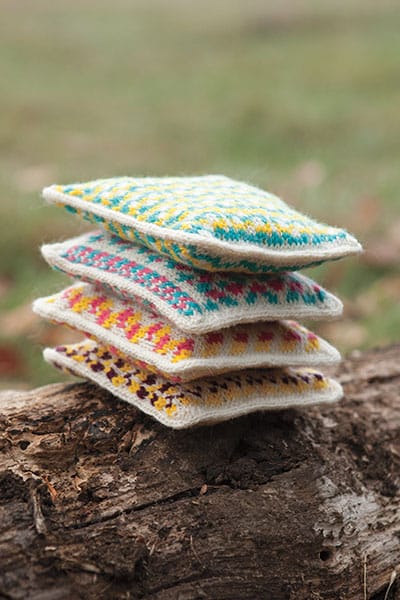 A stack of knitted Lavender Sachets from Knitpicks.com