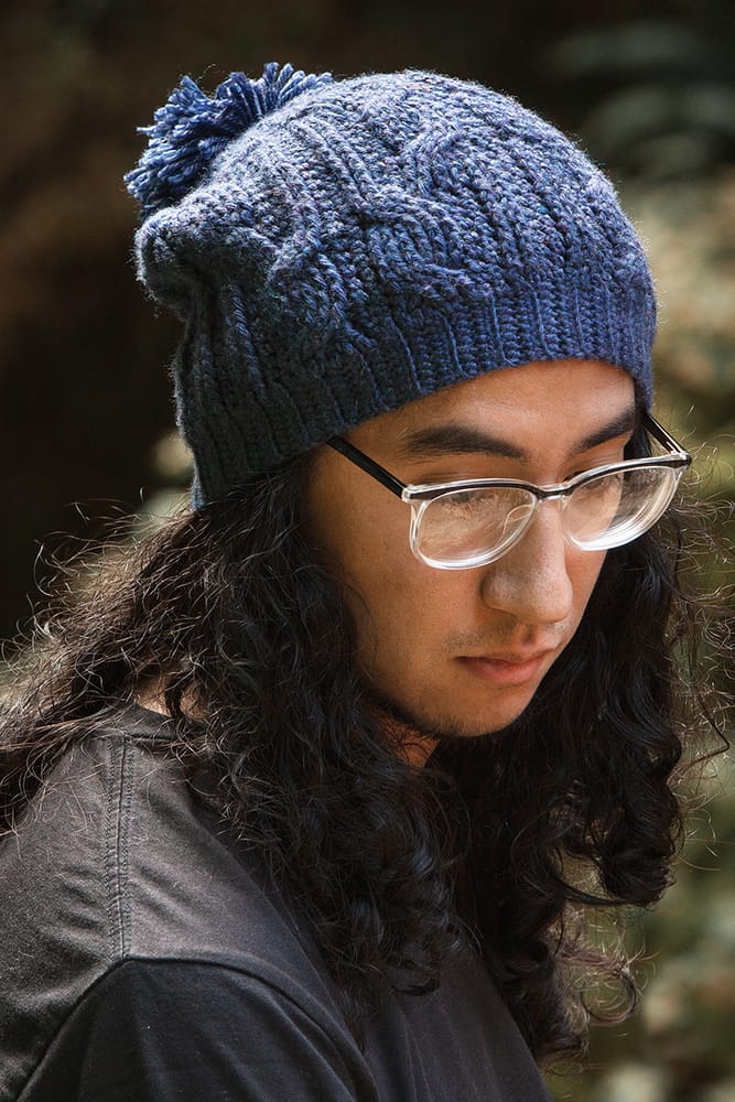 Regan wearing WeCrochet's Winter Cable Hat