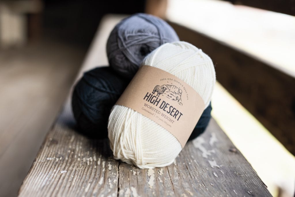 3 balls of High Desert Yarn on a board