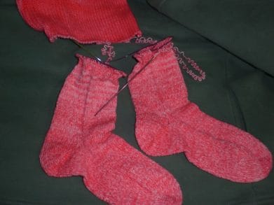 Nearly complete toe-up magic loop pink socks